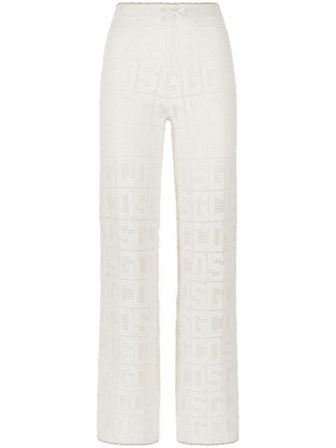 GCDS monogram crochet-knit trousers
