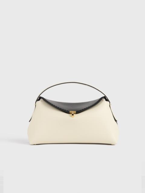 TOTEME T-lock embroidered leather top handle black/milk