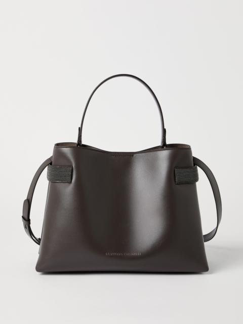 Brunello Cucinelli Essence top-handle bag in calfskin with precious bands