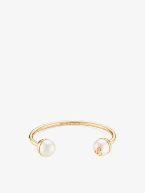 JIMMY CHOO JC Pearl Cuff
Gold-Finish Metal Cuff Bracelet with Pearls