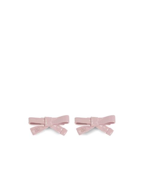 BALENCIAGA bow-shaped brass earrings