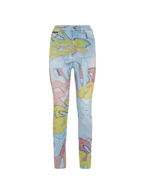 Bombing graffiti-print skinny jeans