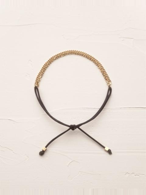 SAINT LAURENT DUAL CHAIN BRACELET IN 18K YELLOW GOLD AND LEATHER