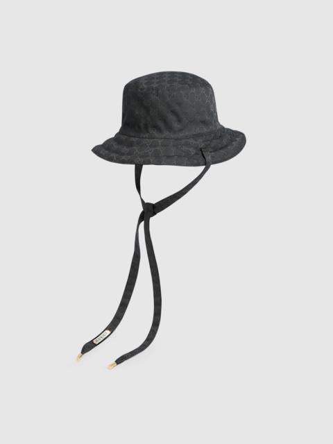 GUCCI Reversible hat in GG canvas and nylon