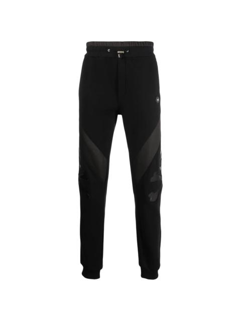 skull patch jogging trousers