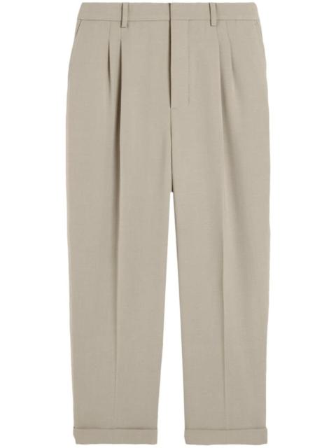 AMI Paris pressed-crease pleated tapered trousers