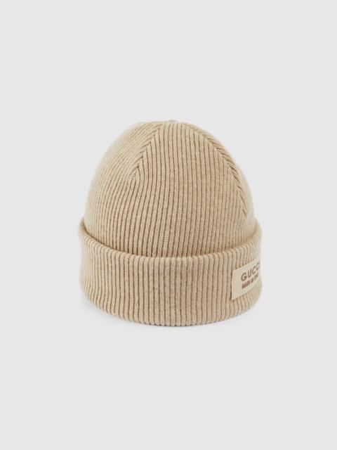 Knit wool hat with patch