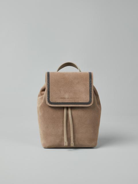 Suede backpack with precious contour