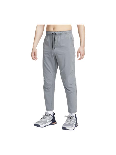 Nike Nike Unlimited Dri-FIT Straight Leg Versatile Pants Asia Sizing 'Smoke Grey' FB7547-084