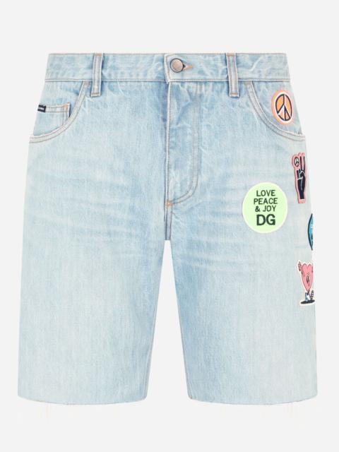 Dolce & Gabbana Light blue denim shorts with multiple patches