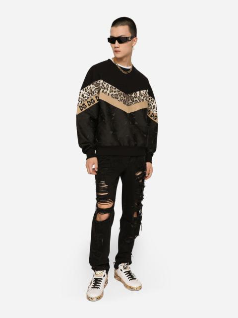 Mixed-fabric sweatshirt with leopard inlay and patch embellishment