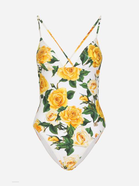 One-piece swimsuit with plunging neckline and yellow rose print