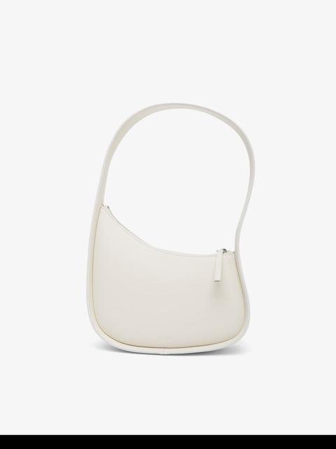 The Row Half Moon ivory leather bag