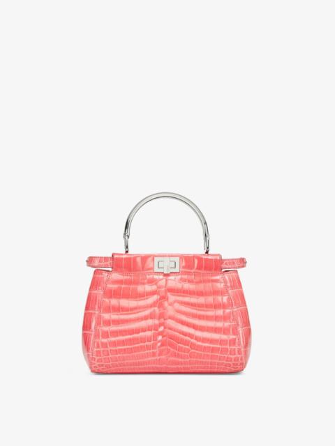 FENDI Iconic small Peekaboo bag, made of exquisite, pink crocodile leather and embellished with the classi