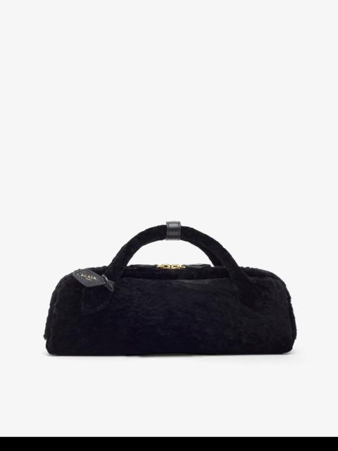 Alaïa Le Teckel black shearling clutch