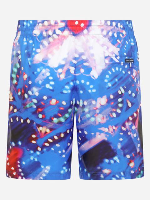 Dolce & Gabbana Mid-length swim trunks with illumination print