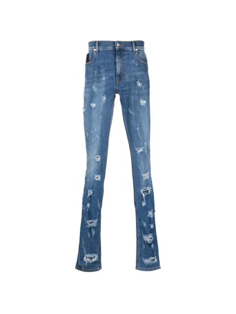 distressed skinny-fit denim jeans