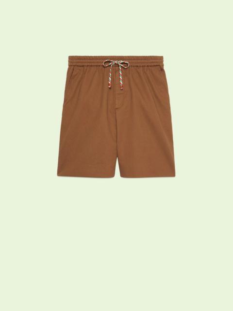 GUCCI Cotton shorts with Gucci print