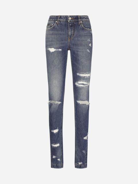 Girly jeans with ripped details