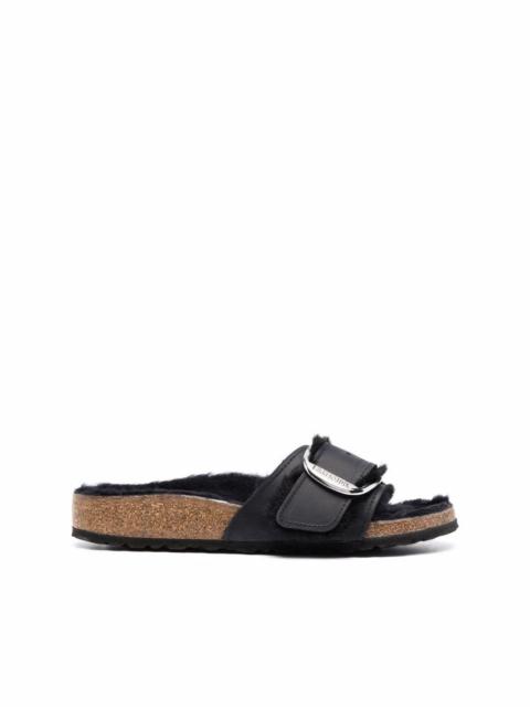 shearling-lined single-buckle sandals