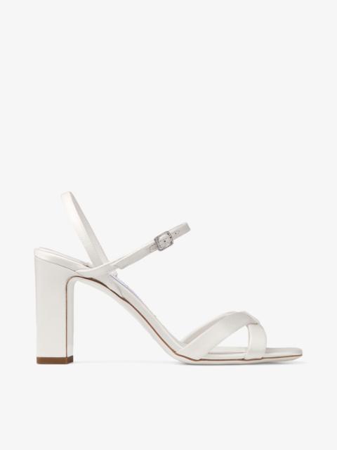 JIMMY CHOO Elsy Block Heel 85
Ivory Satin Sandals with Crystal-Embellished Buckle