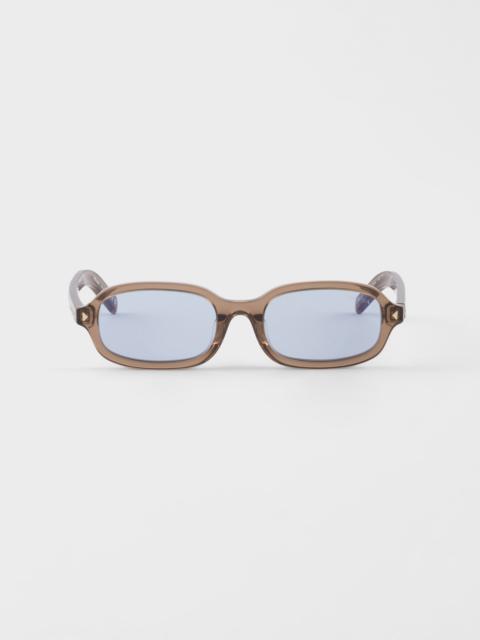 Prada Sunglasses with the iconic metal plaque