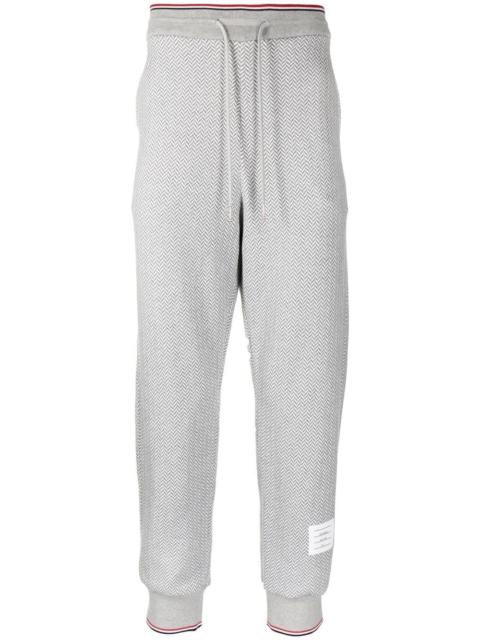 Thom Browne herringbone-pattern logo-patch track pants
