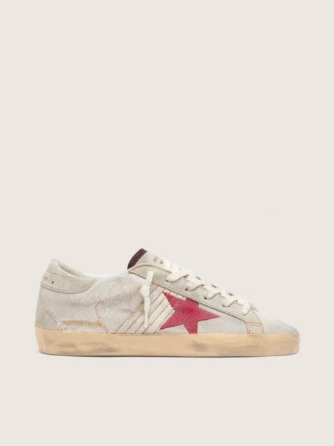 Golden Goose Women’s Super-Star LTD in white pony skin with red suede star