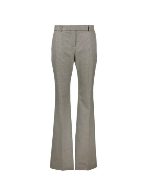 flared puppytooth-wool trousers