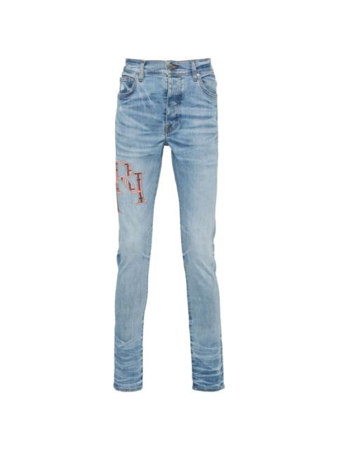 logo-embroidered skinny jeans