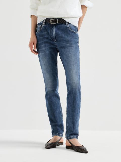 Brunello Cucinelli Stretch denim slim five-pocket trousers with shiny leather tab