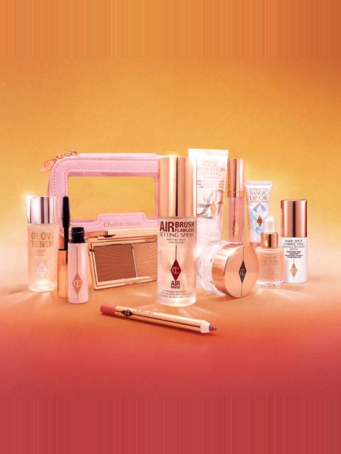 Charlotte Tilbury CHARLOTTE’S MINI GLOW + GO TRAVEL BEAUTY BAG Over 50% Off