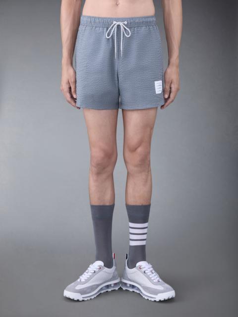 Thom Browne striped seersucker-texture swim shorts