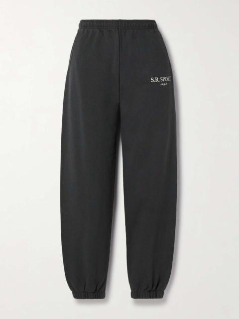 Sporty & Rich Printed cotton-jersey track pants Black