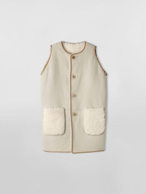 REVERSIBLE SHEARLING VEST WITH CONTRAST PIPING