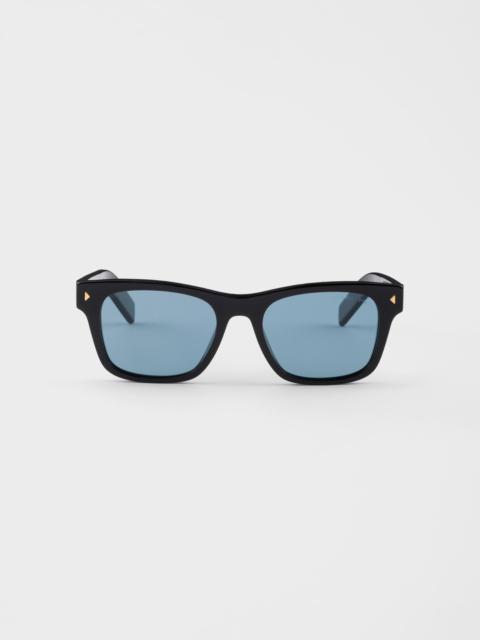 Prada Sunglasses with the iconic metal plaque