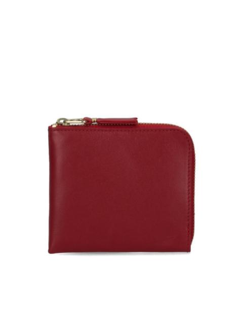 Comme Des Garçons zip-up leather wallet