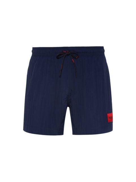HUGO QUICK-DRY SWIM SHORTS WITH RED LOGO LABEL