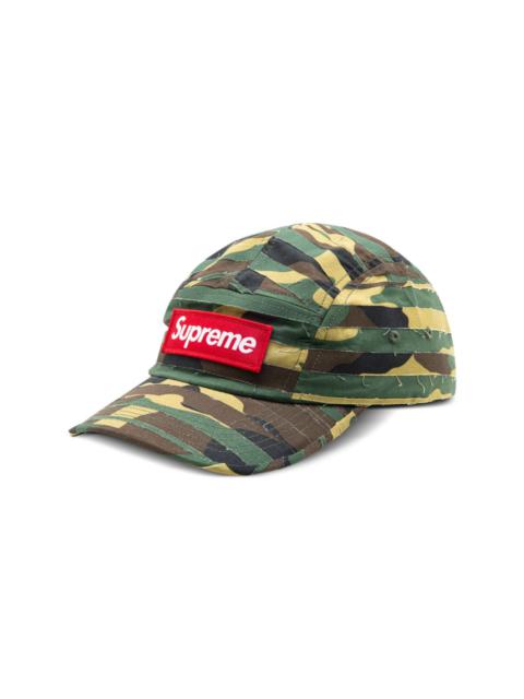 layered camouflage-pattern camp cap