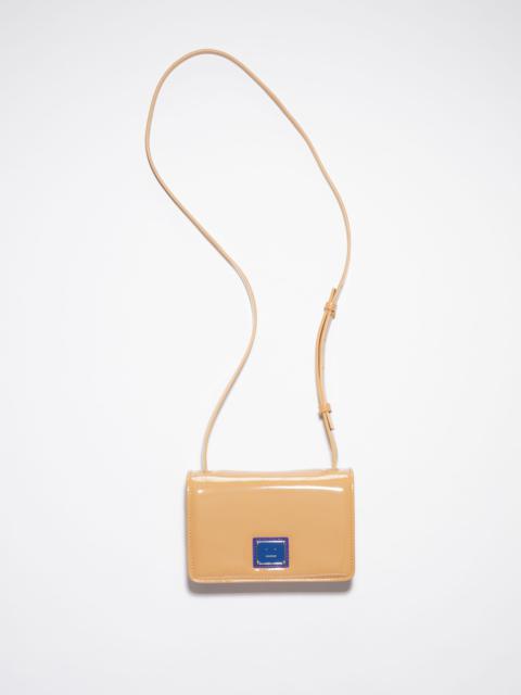 Acne Studios Mini crossbody Face bag - Beige