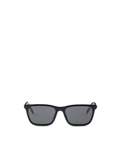 Prada sunglasses with the iconic metal plaque