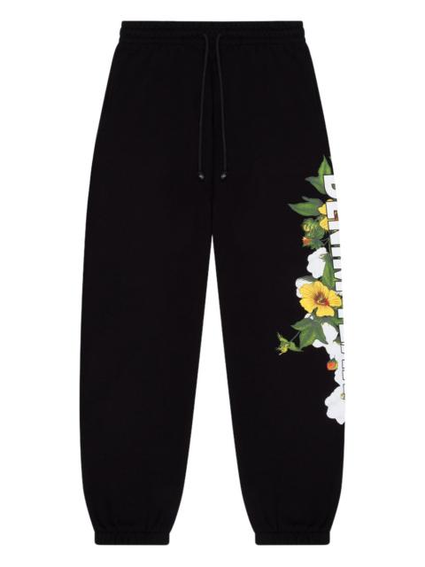 DENIM TEARS floral-detail logo-print track pants