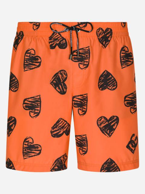 Dolce & Gabbana Mid-length swim trunks with DG heart print