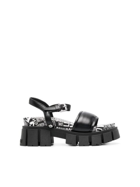 Moschino toe-strap flat leather sandals
