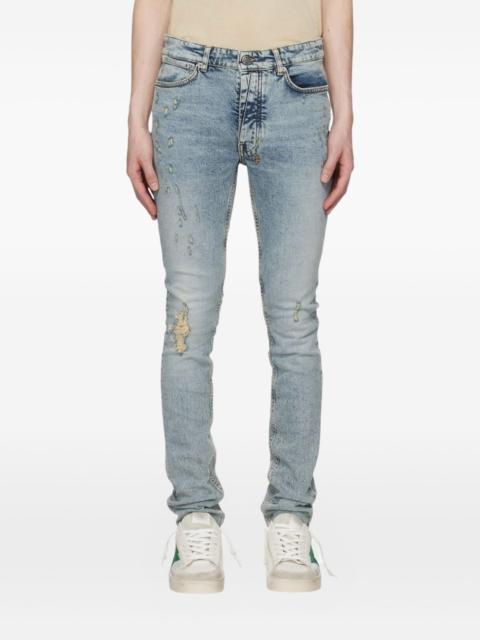 Ksubi distressed logo-patch jeans