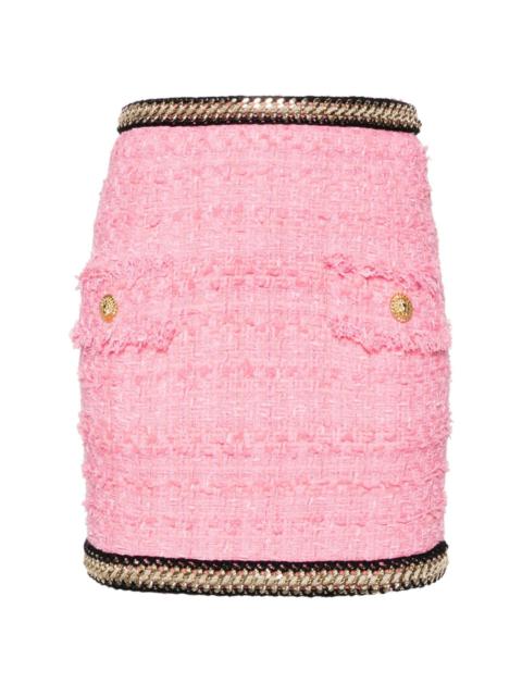 chain-embellished tweed miniskirt