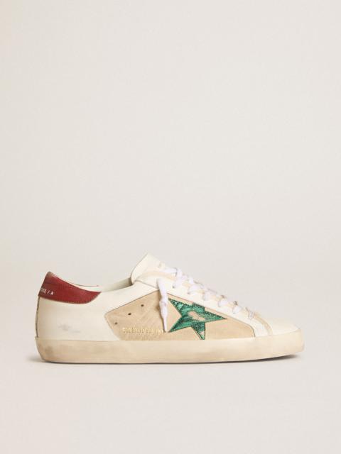 Super-Star LTD in suede with green metallic star and red heel tab