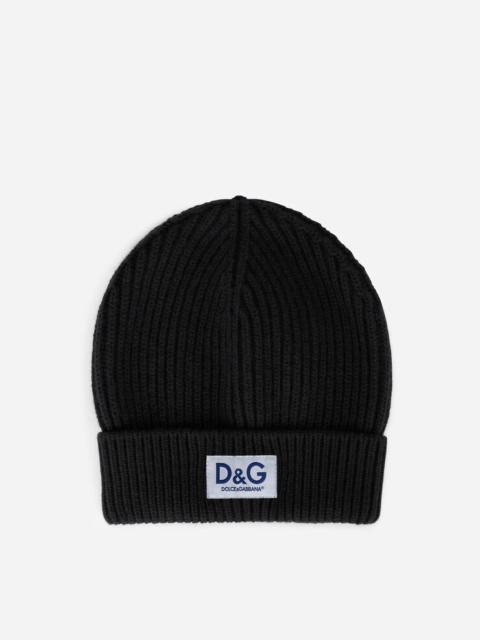 Knit wool hat with D G patch