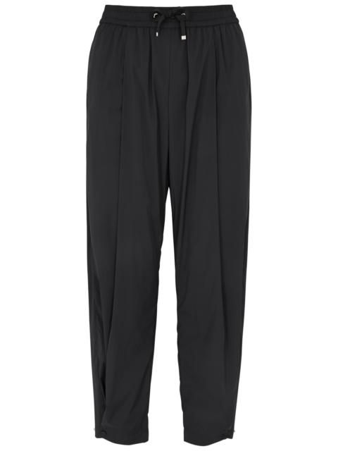 Cropped tapered nylon trousers