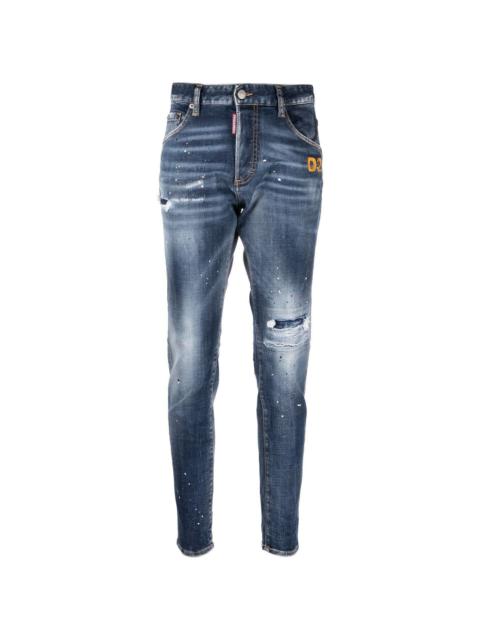 distressed-finish denim jeans